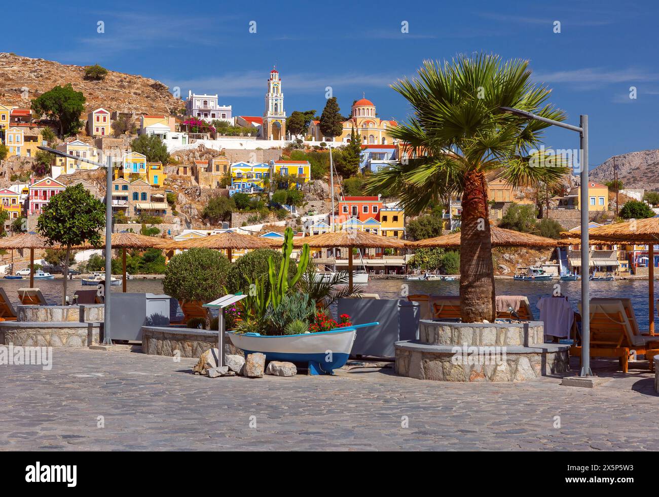 hillside-view-of-the-colorful-buildings-and-busy-harbor-on-symi-island