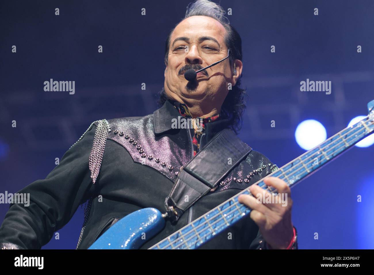 Musical group Los Tigres Del Norte perform during concert at the