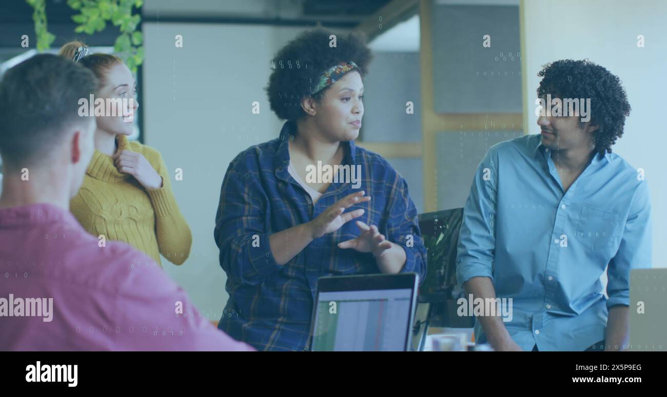 Diverse team discussing work, biracial woman leading Stock Photo