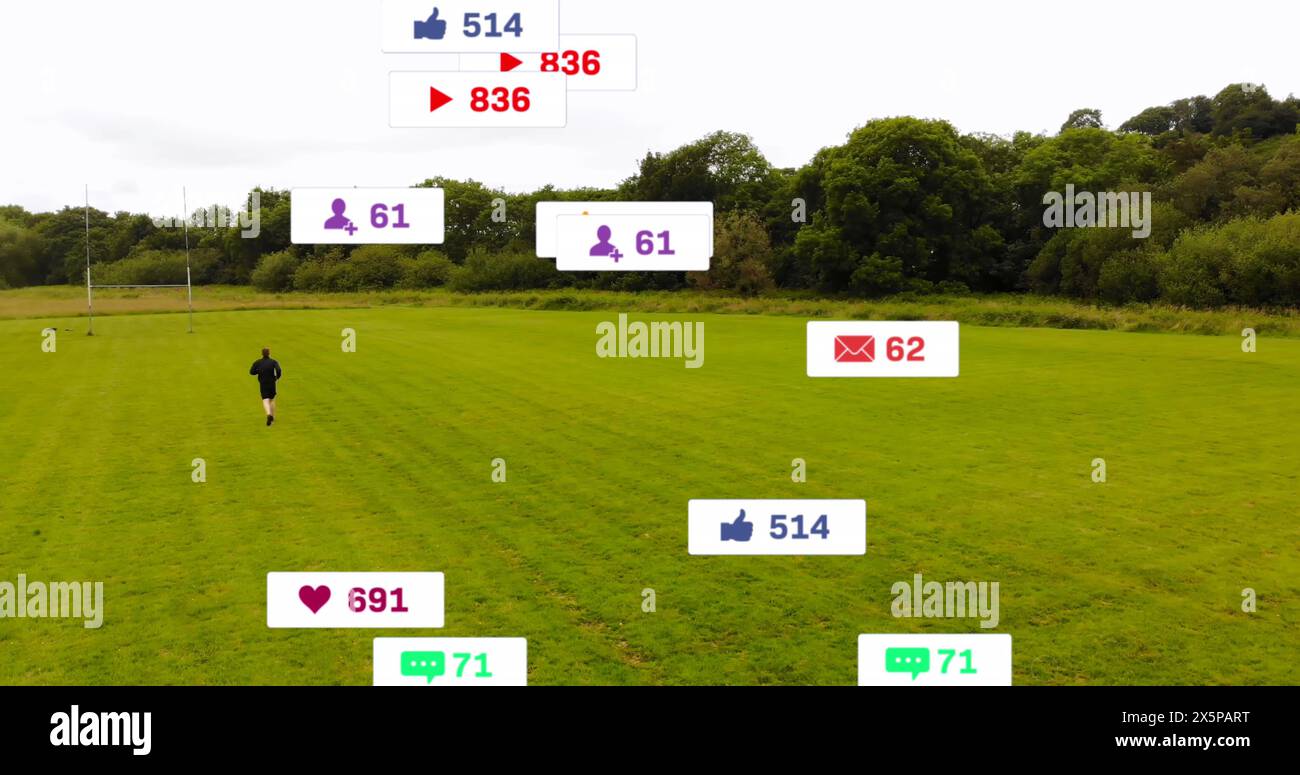 Image of social media icons against aerial view of male rugby player running in sports field Stock Photo