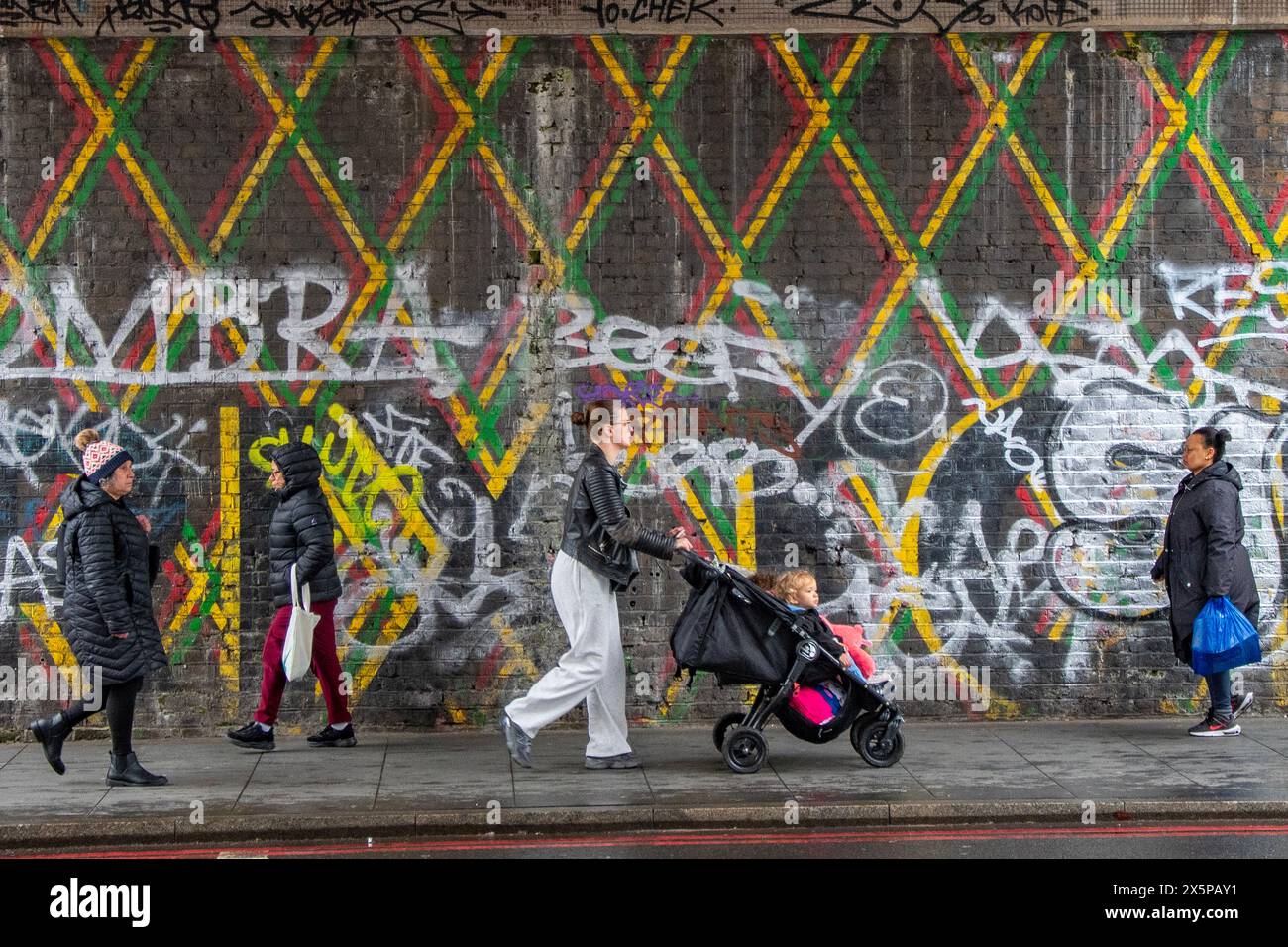 Candid street shot of a cross section of women going about their daily life in Brixton, South London Stock Photo