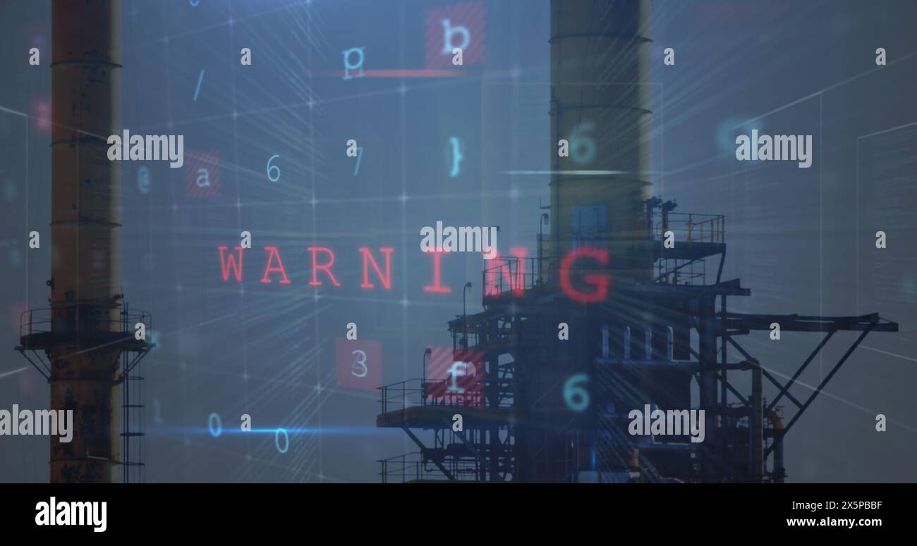 Red and blue hues dominating industrial towers with digital WARNING overlay Stock Photo
