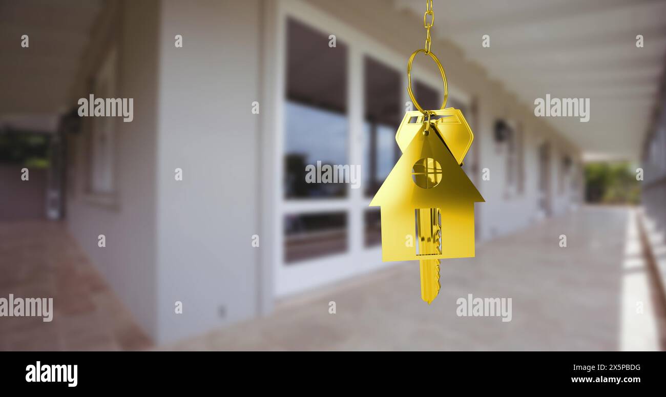 Image of golden key with house shape over house Stock Photo