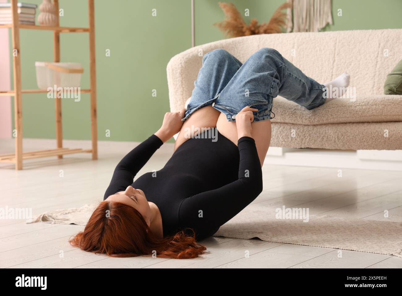 Woman wearing tight jeans hi-res stock photography and images - Alamy