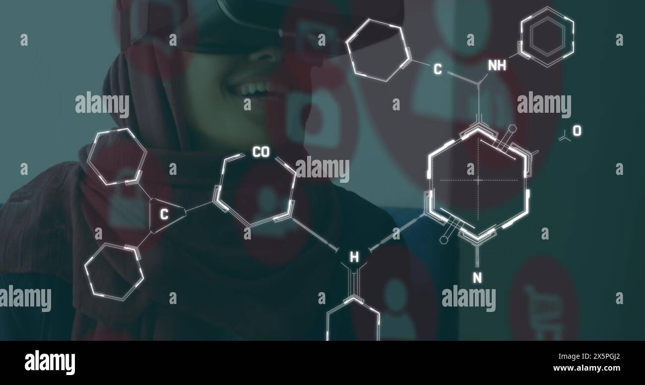 Image of chemical formulas over middle eastern woman in vr headset Stock Photo