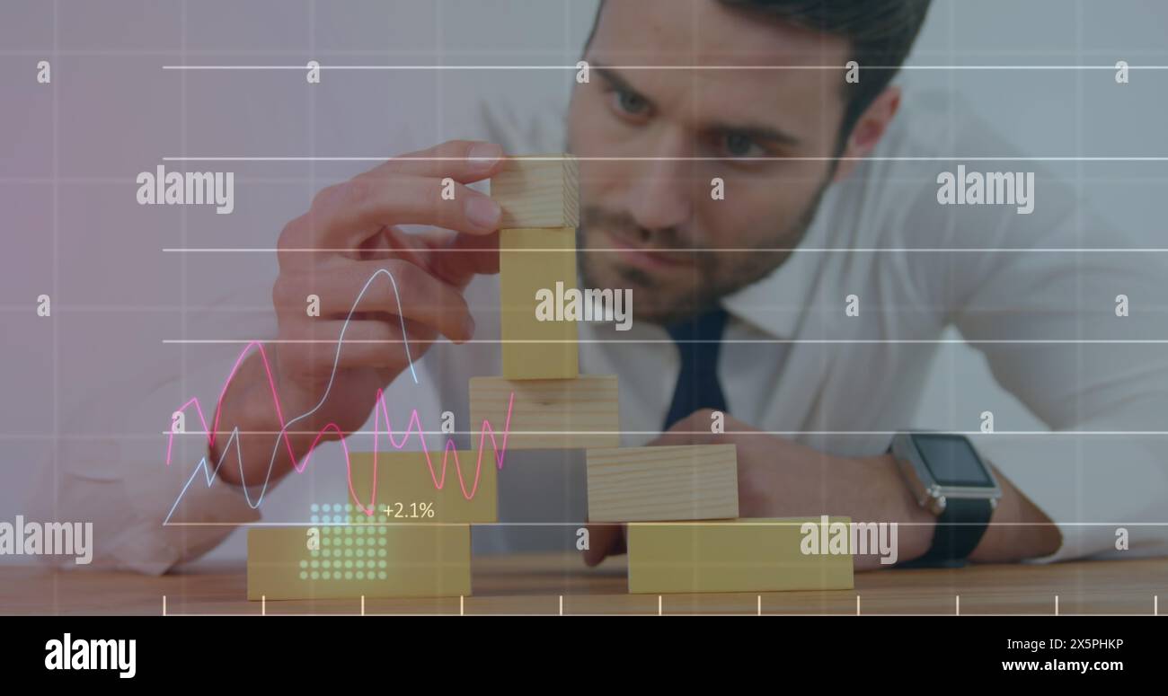 Image of financial data processing over caucasian businessman Stock Photo