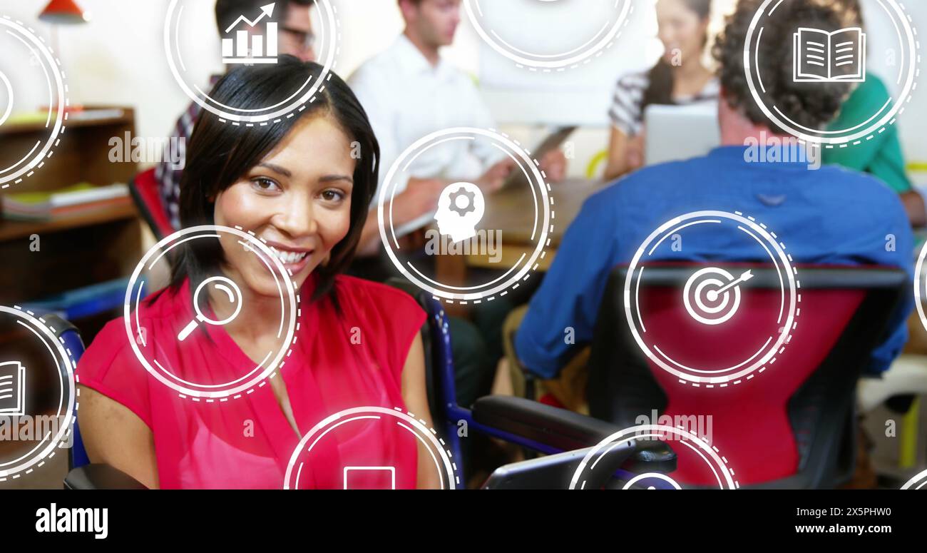 Image of icon in circles over smiling biracial woman looking at camera in office Stock Photo