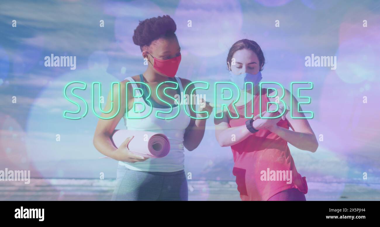 Image of subscribe neon text over diverse women in face mask exercising Stock Photo