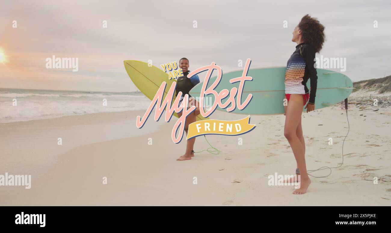 Image of my best friend text over happy diverse female friends with surfboards Stock Photo