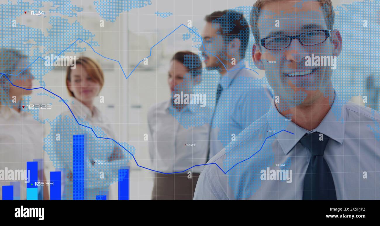Image of financial data processing and world map over diverse business people Stock Photo