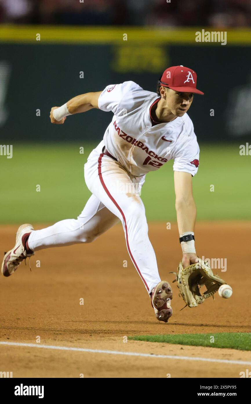 May 10, 2024: Razorback infielder Jared Sprague-Lott #12 comes towards the grass to field a ball hit down the third base line. Arkansas defeated Mississippi State 7-5 in Fayetteville, AR. Richey Miller/CSM Stock Photo
