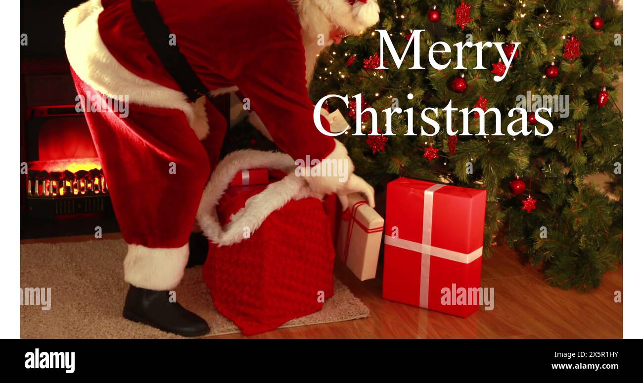 Caucasian senior male dressed as Santa Claus placing gifts under tree Stock Photo