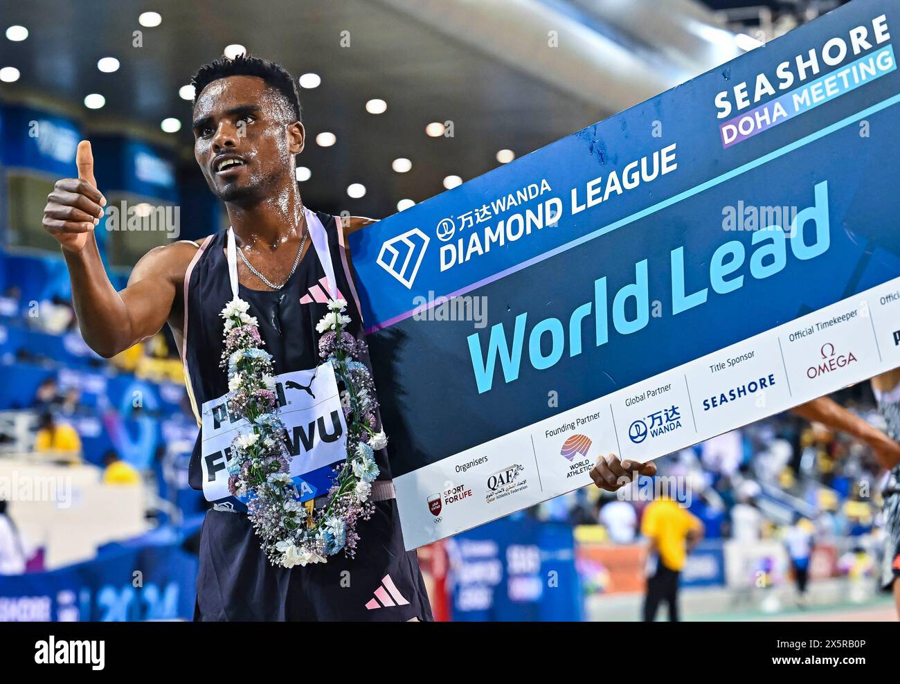 Doha, Qatar. 10th May, 2024. Samuel Firewu of Ethiopia celebrates after