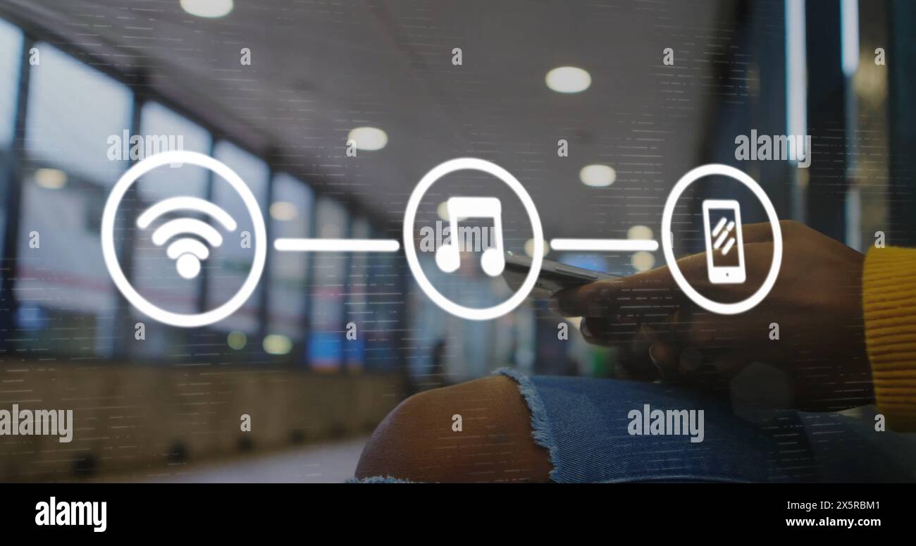 Image of flowchart of icons over midsection of african american man using smartphone Stock Photo