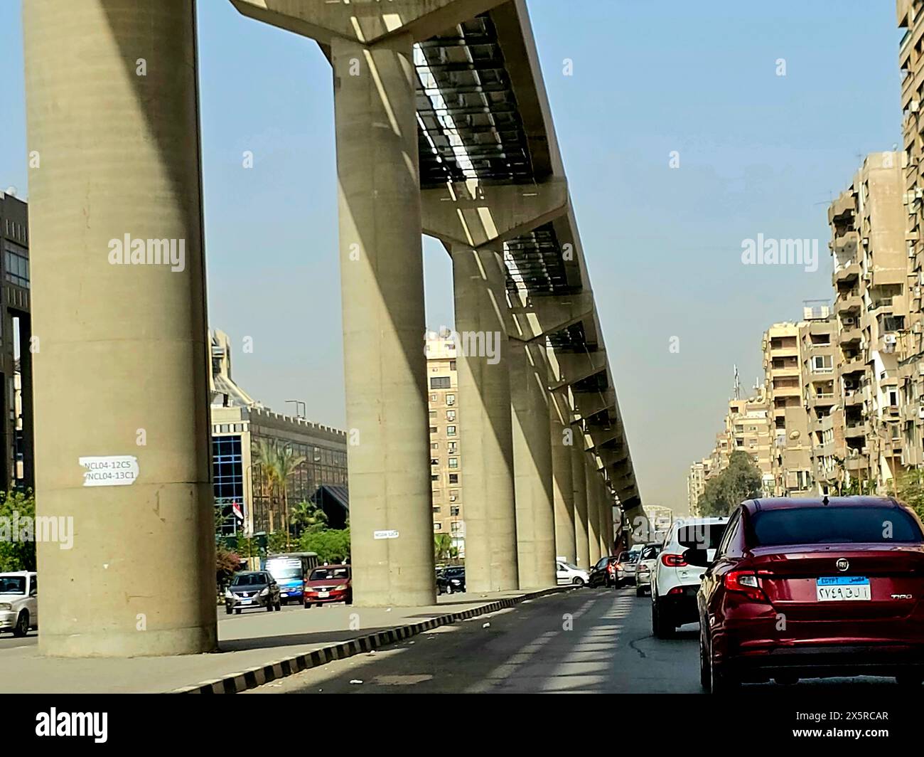 Cairo, Egypt, April 24 2024: monorail project site that is under construction with scaffolds and crane, Cairo monorail is a two-line mono rail rapid t Stock Photo