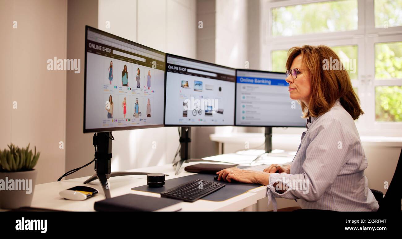 Woman Using Online Ecommerce Shop On Desktop Stock Photo