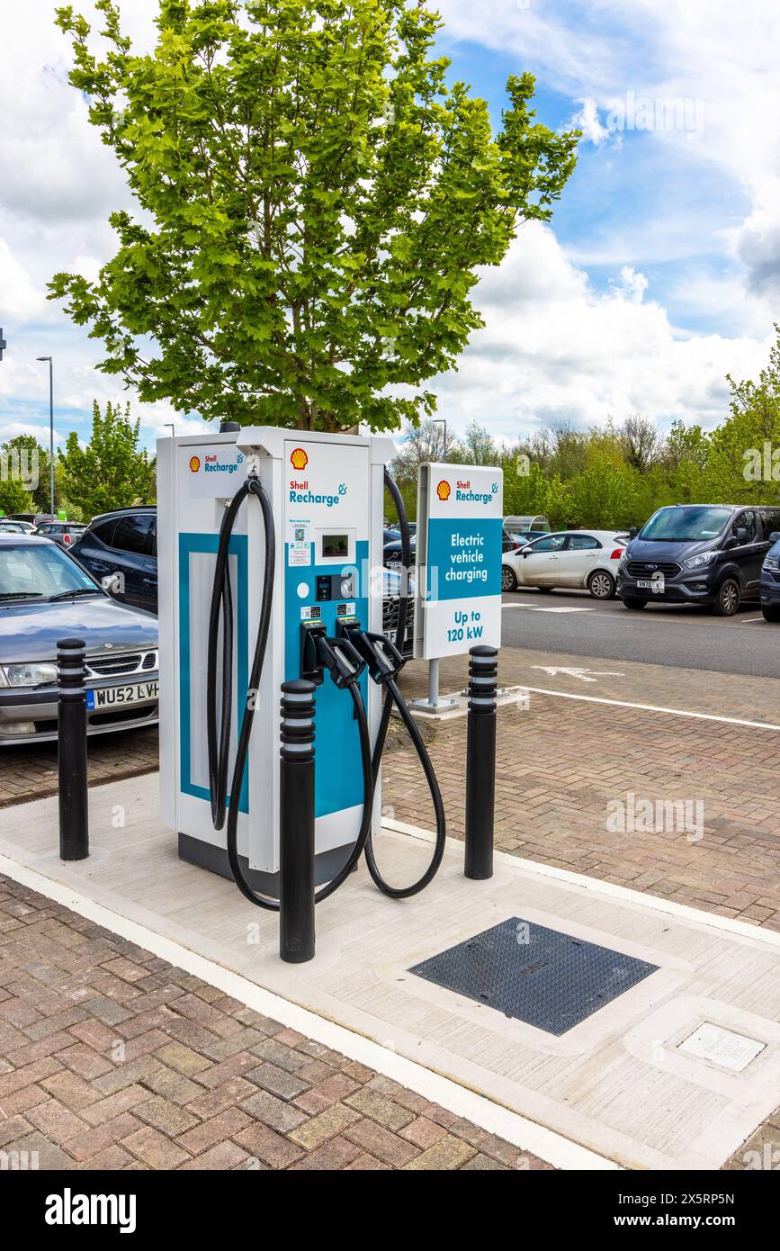 Public Electric Vehicle charging points in supermarket car park, Chipping Sodbury South Gloucestershire, United Kingdom Stock Photo