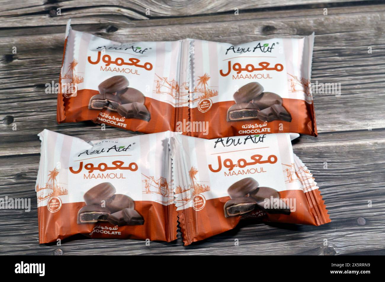 Cairo, Egypt, April 8 2024 Abu Auf Maamoul coated with brown dark