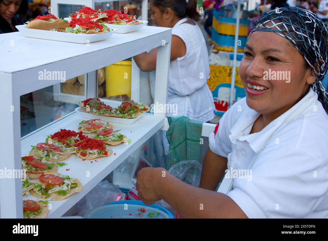 Oaxaca, Mexico, North America.  Day of the Dead Celebrations.  Lady Selling Tortilla Snacks. Stock Photo