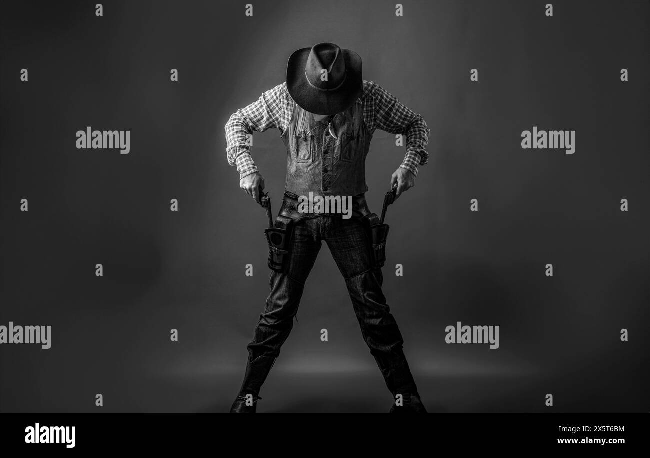 Man wearing cowboy hat, gun. West, guns. Cowboy with a pistol, guy in a