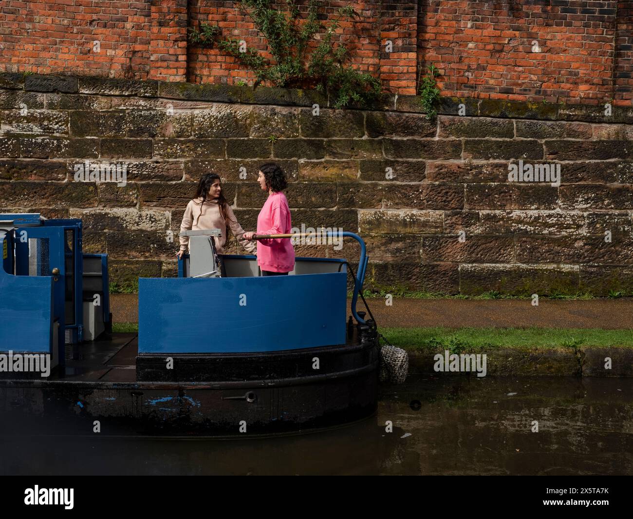 Steering canal boat hi-res stock photography and images - Alamy