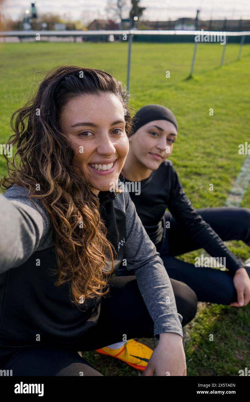 Female soccer players taking selfie stock photo alamy