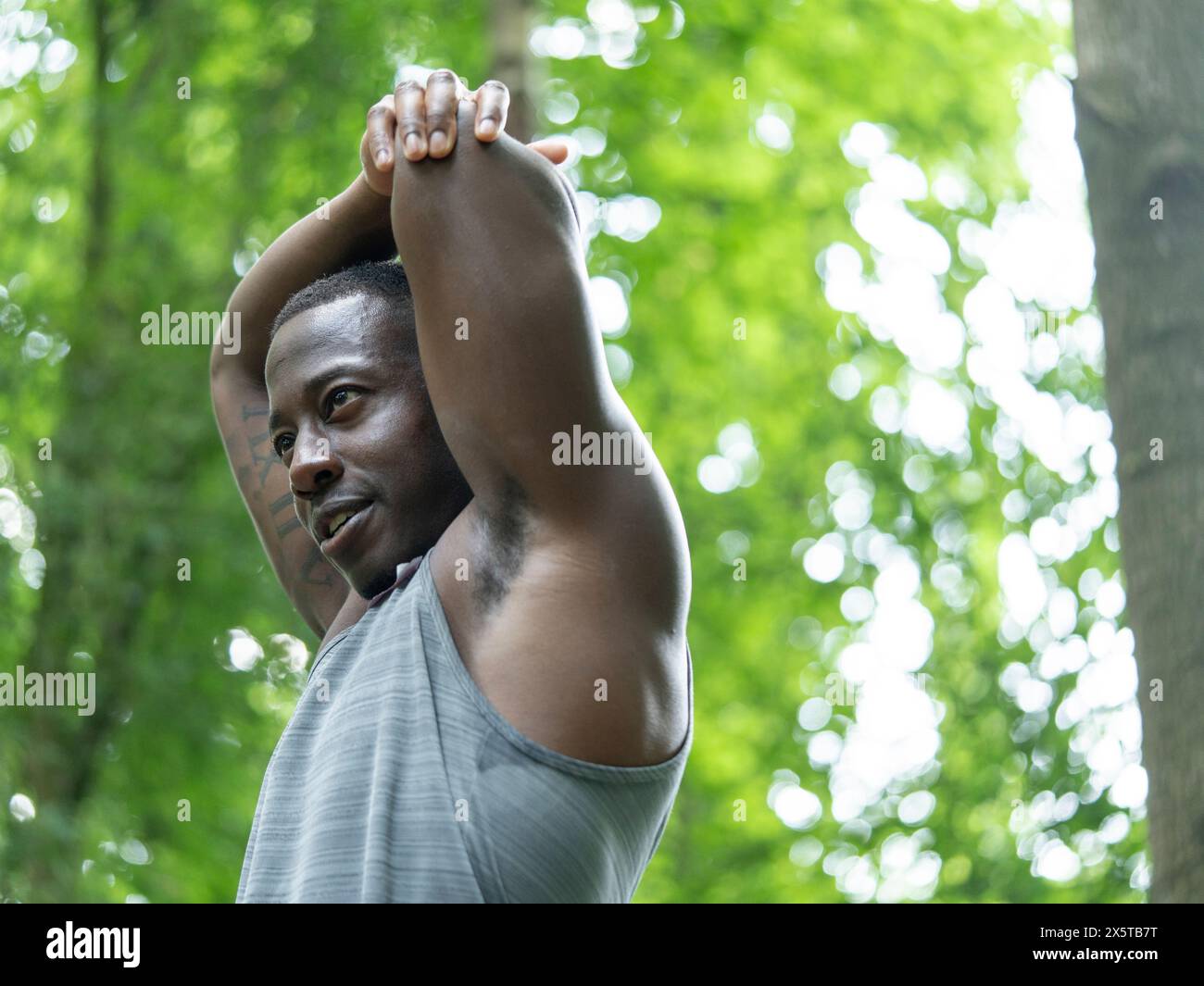 Stretching african american man hi-res stock photography and images - Alamy