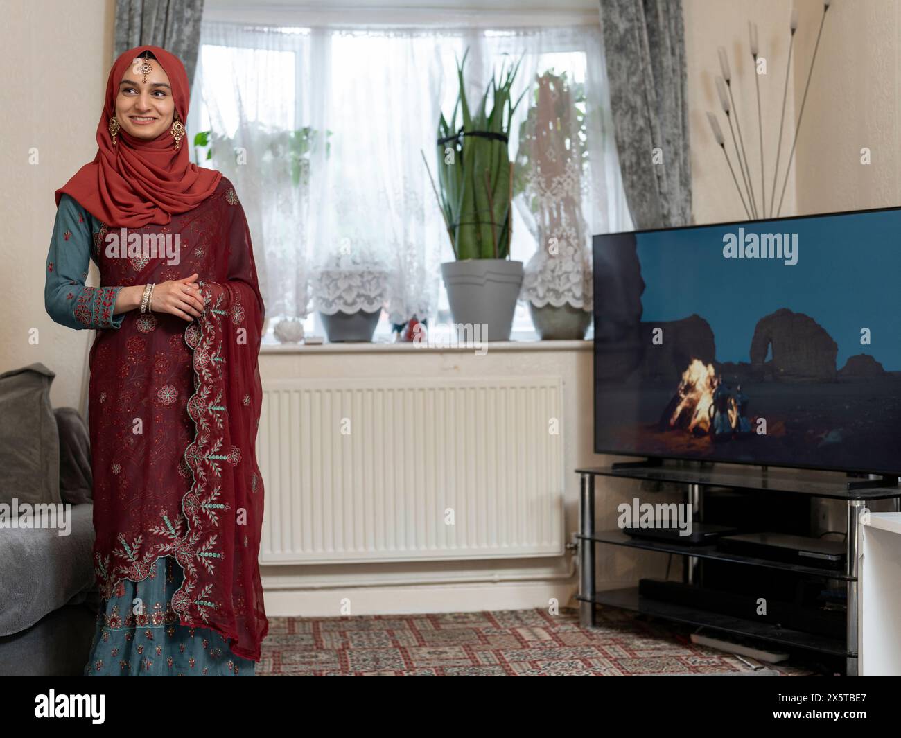 Wearing traditional dress hi-res stock photography and images - Alamy