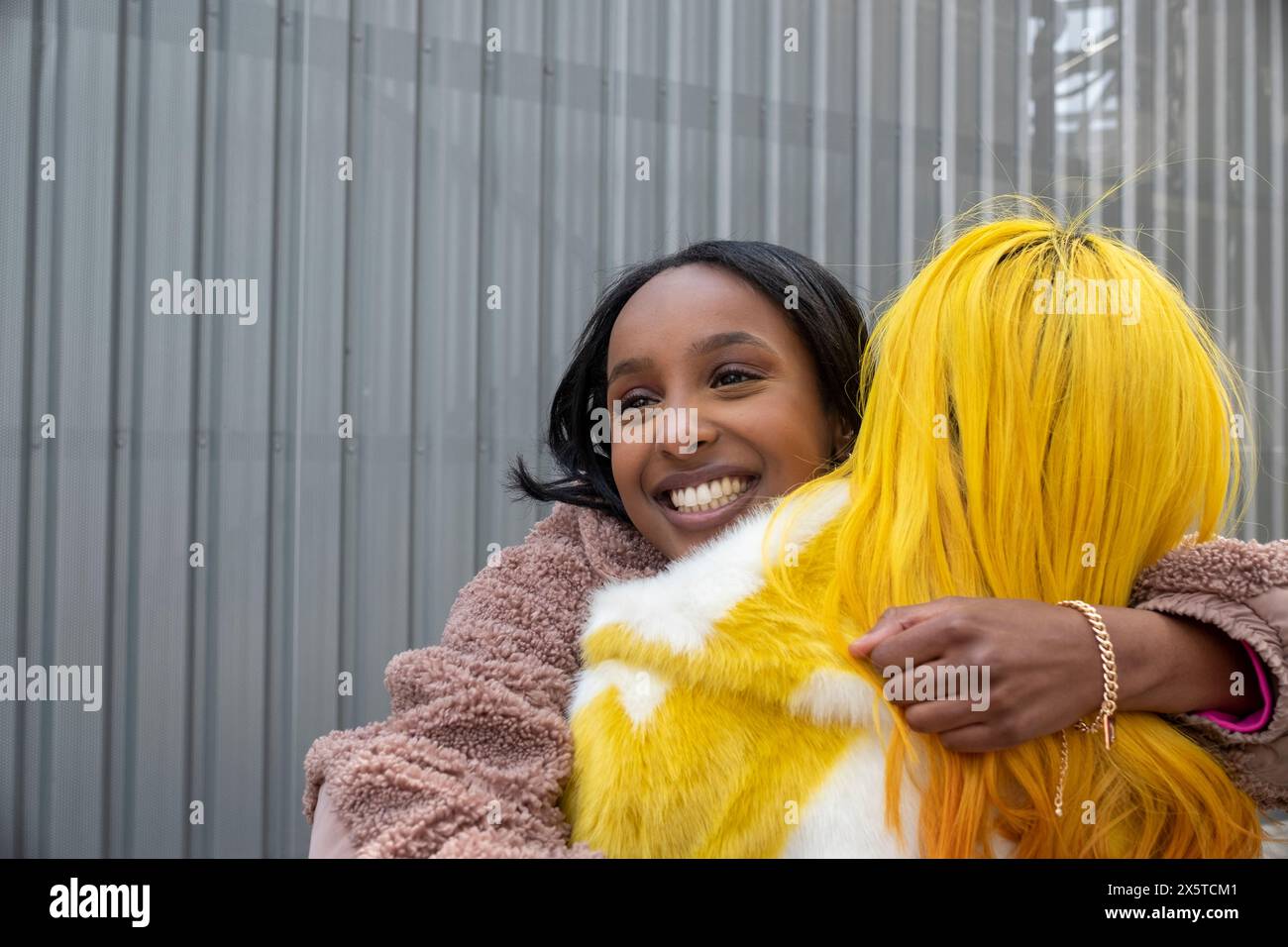 Group of young women hugging hi-res stock photography and images - Alamy