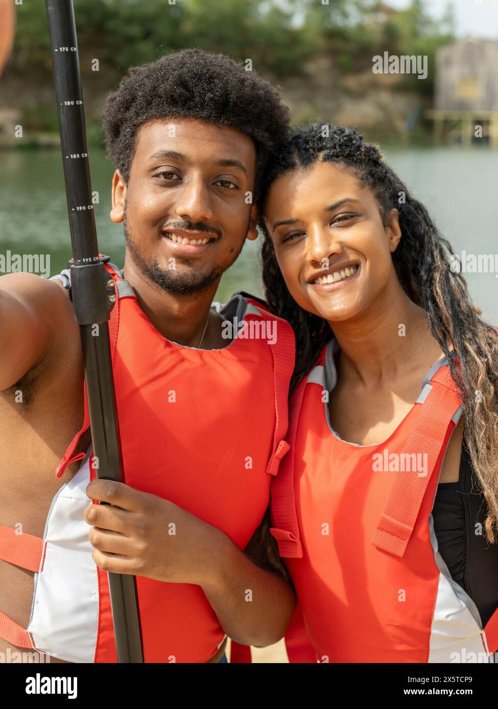 People wearing life jackets hi-res stock photography and images - Alamy