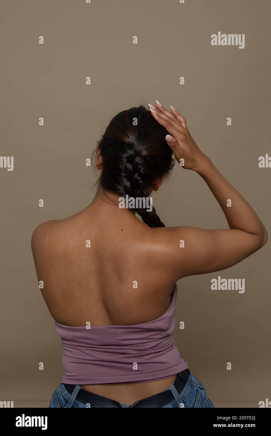 Black woman braids touching hi-res stock photography and images - Alamy