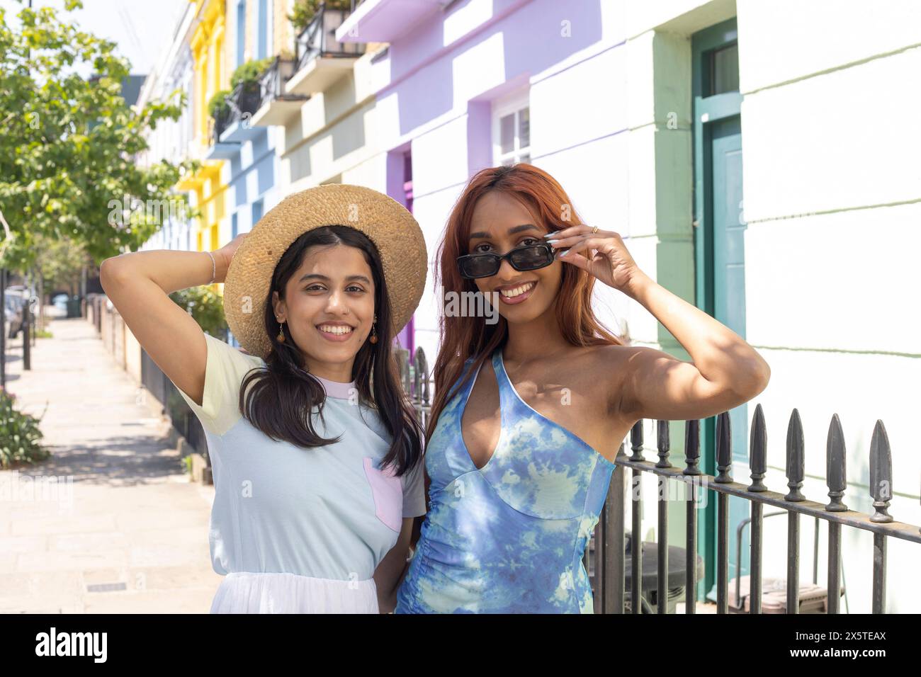 Portrait smiling women standing hi-res stock photography and images - Alamy