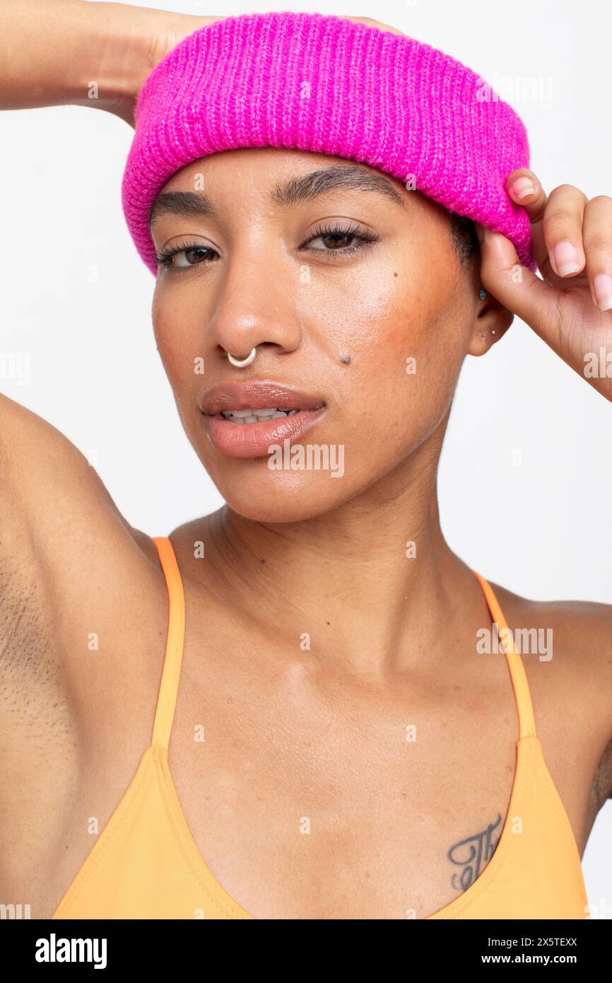Woman in orange and pink hi-res stock photography and images - Alamy