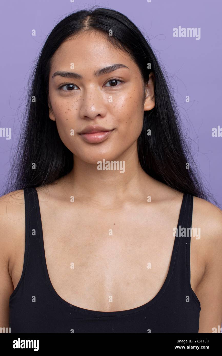 Portrait of young woman with black hair Stock Photo