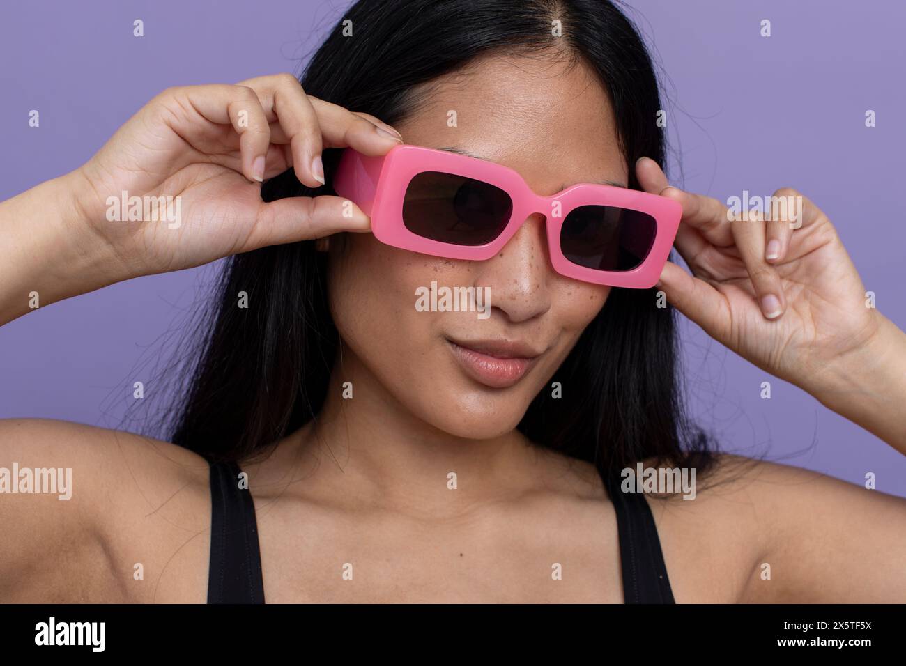 Woman wearing pink one person hi-res stock photography and images - Alamy