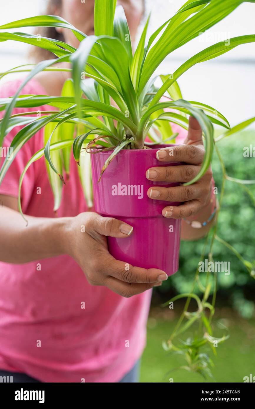 Woman outdoors holding pink hi-res stock photography and images - Alamy