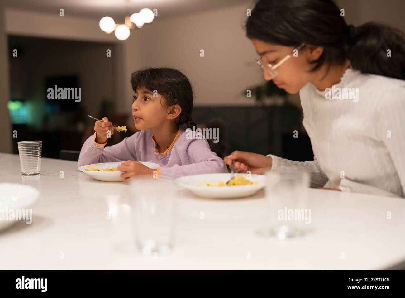 Indian family eating 2023 hi-res stock photography and images - Alamy
