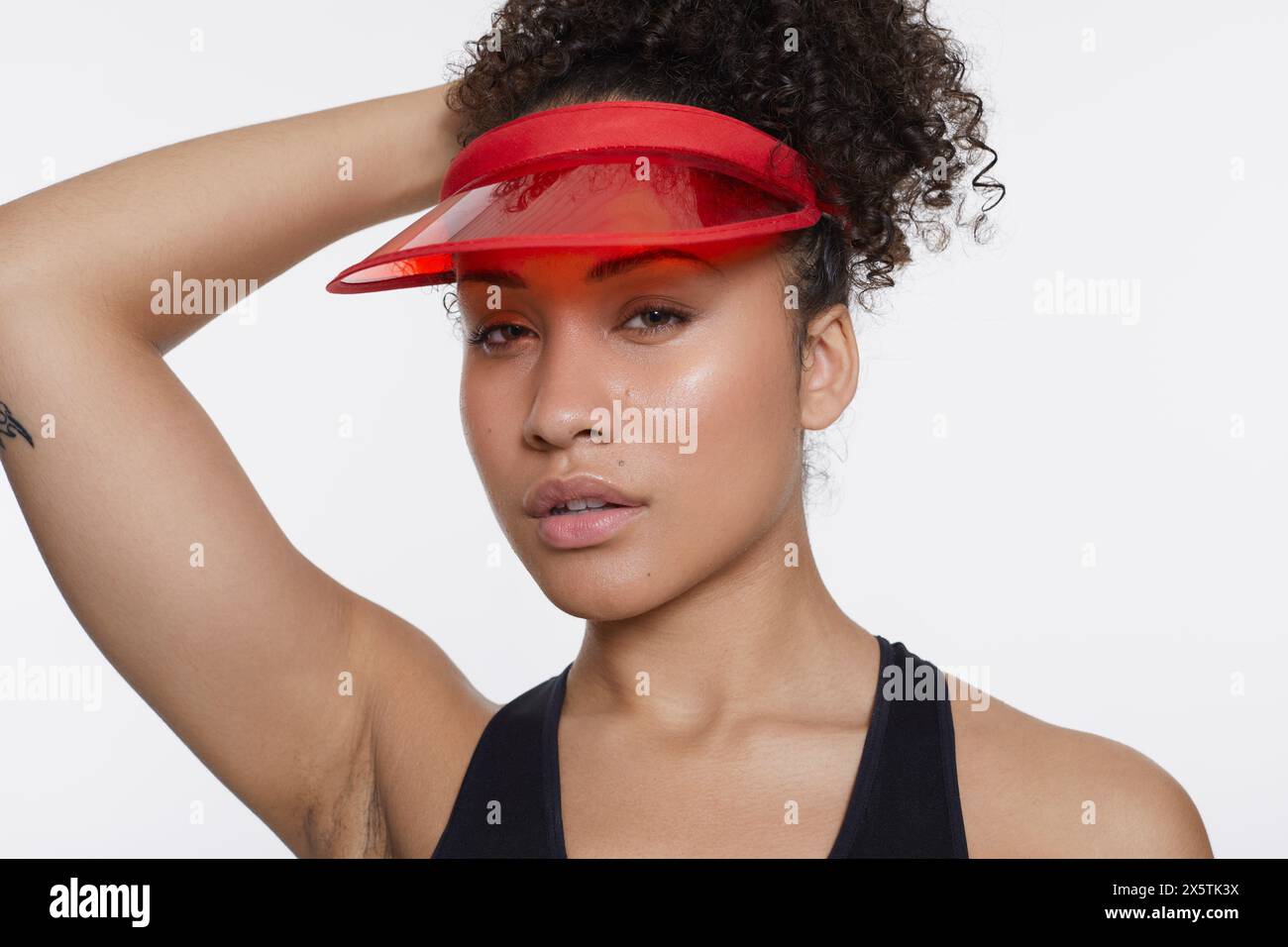 Woman wearing red tank top hi-res stock photography and images - Alamy
