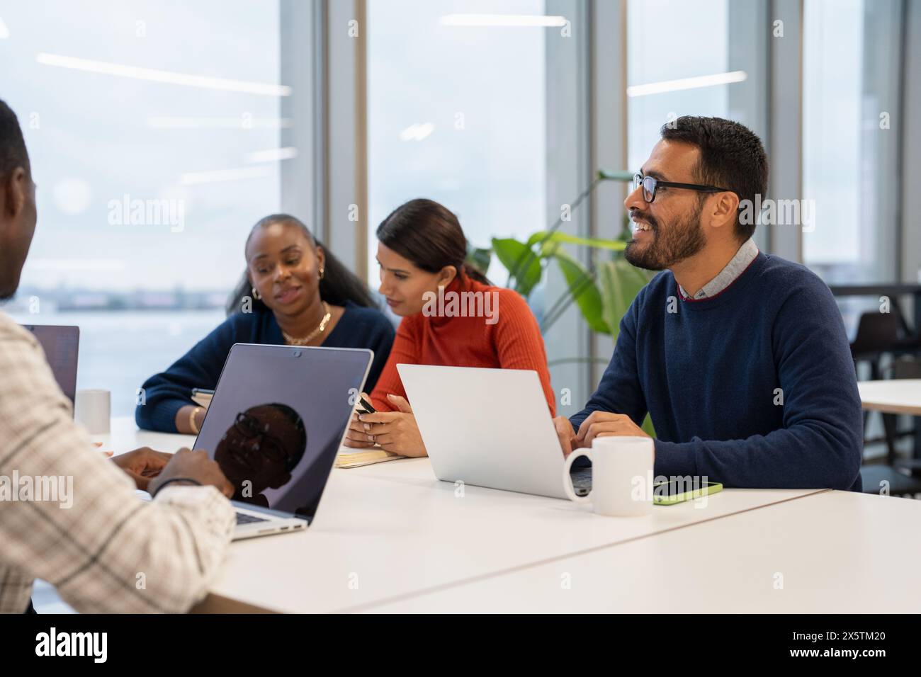 Four young office workers hi-res stock photography and images - Alamy