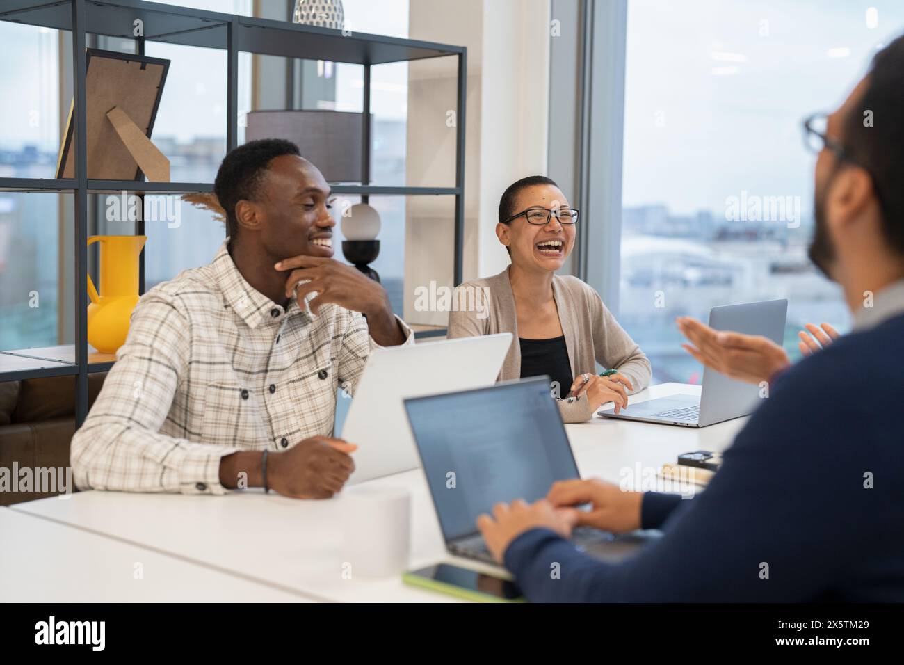 Four young office workers hi-res stock photography and images - Alamy