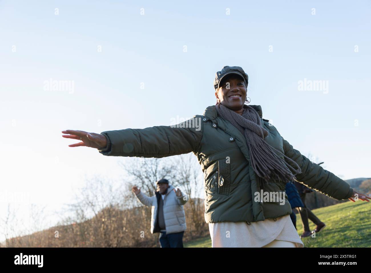 Senior woman arms outstretched hi-res stock photography and images - Alamy
