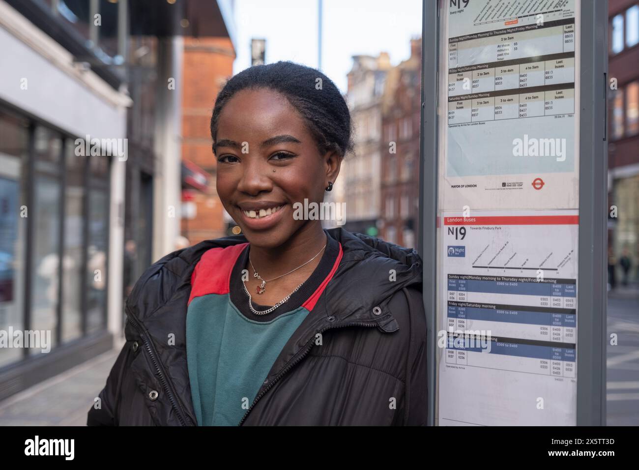 Black african woman waiting bus hi-res stock photography and images - Alamy