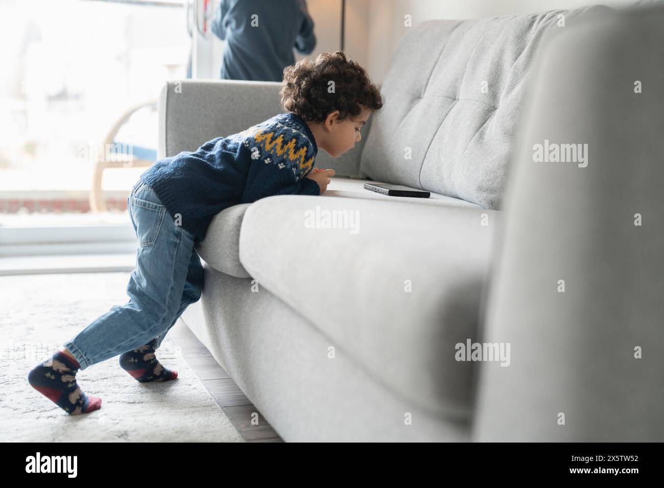 Boy (2-3) using digital tablet at home Stock Photo