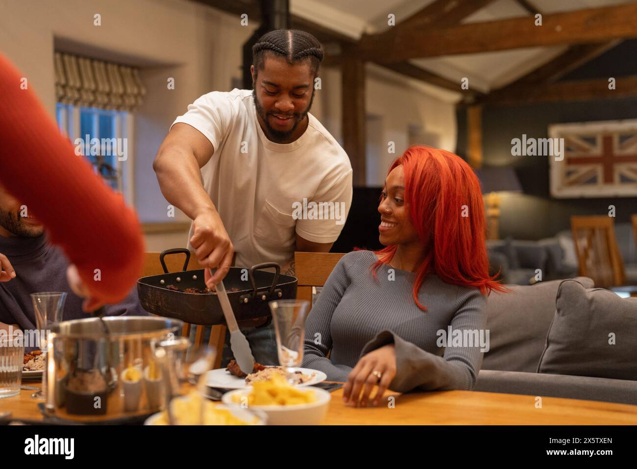 Man serves plate hi-res stock photography and images - Alamy