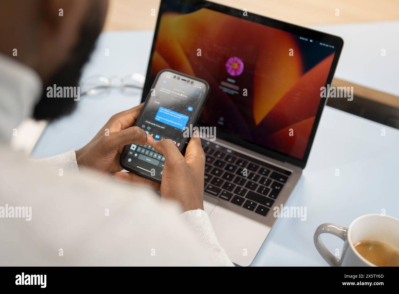 Man working phone laptop in hi-res stock photography and images - Alamy
