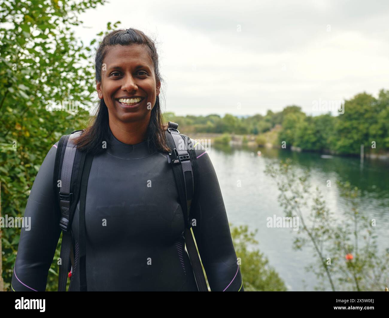 Woman swimming river wetsuit hi-res stock photography and images - Alamy