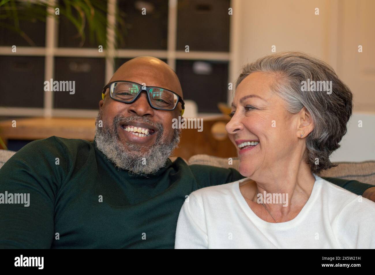 Senior couple relaxing at home Stock Photo - Alamy