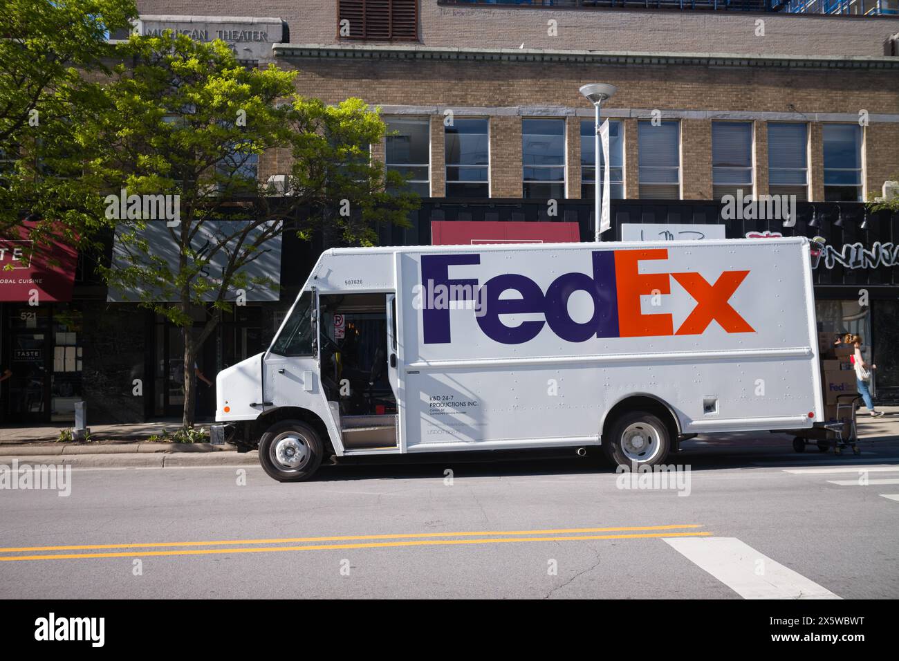 FedEx delivery van parked outside the Michigan Theater in Ann Arbor Michigan USA Stock Photo