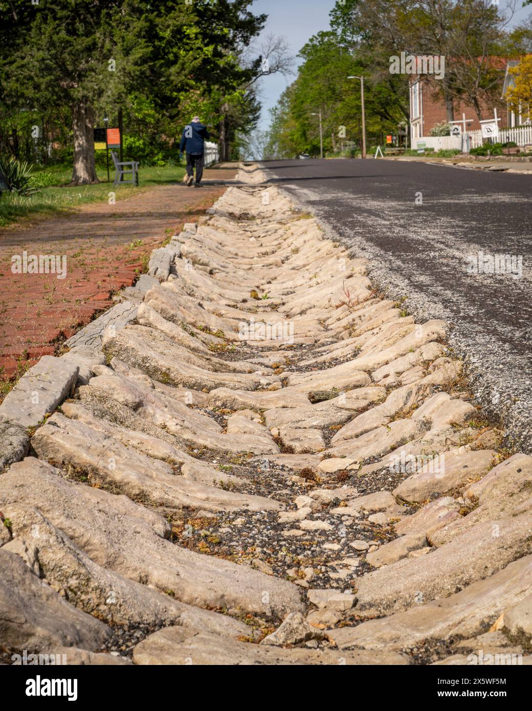 street drain paved with rocks in historic town of Arrow Rock, Missouri Stock Photo