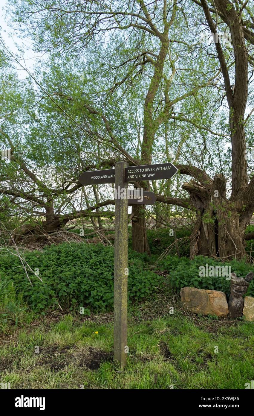 Three way direction signpost in park, Cherry Willingham, Lincoln